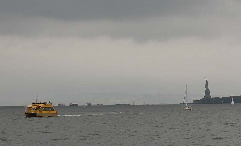 Statue and Tour Boat